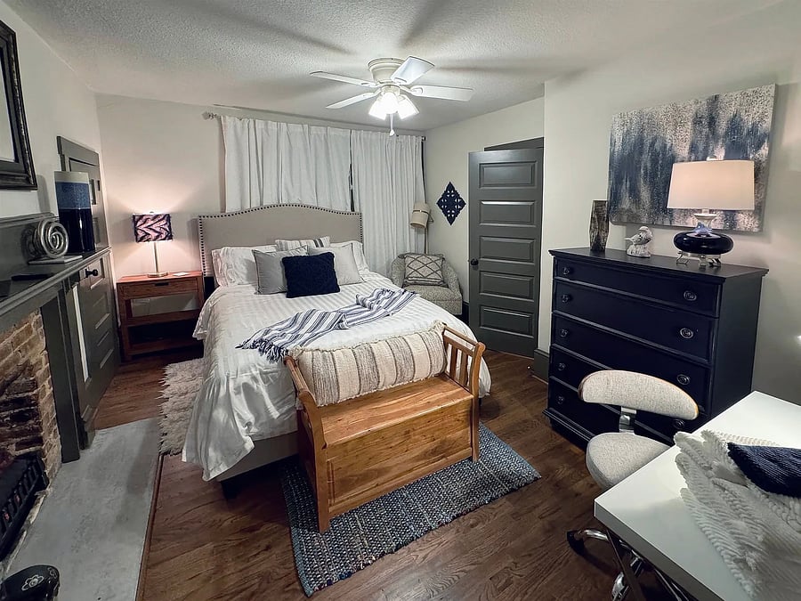 Bedroom B
Electric Fireplace + dedicated workspace, closet, and chest of drawers.