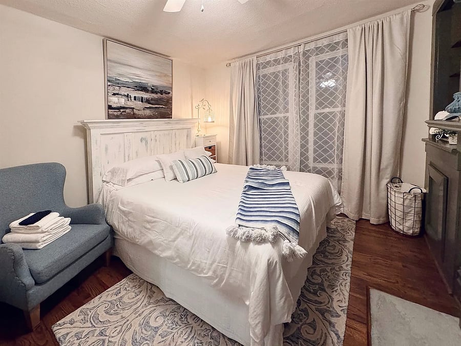 Bedroom C
Electric fireplace + storage shelving and closet.