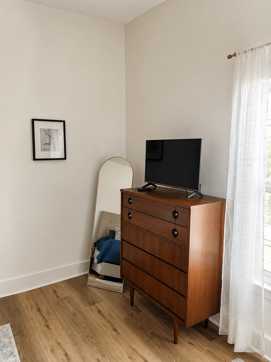 Primary 32 inch Smart TV and dresser