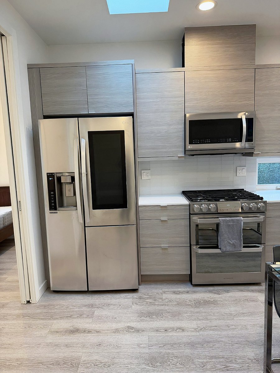 Full kitchen with gas cooking and premium LG appliances