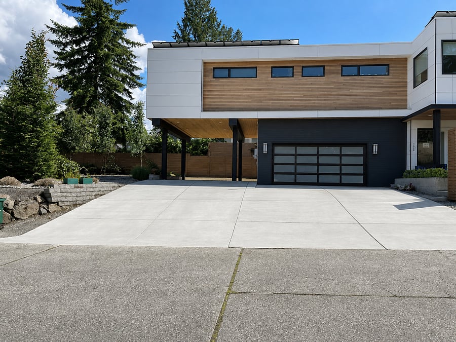 Driveway and dedicated covered parking with tandem space for a second vehicle