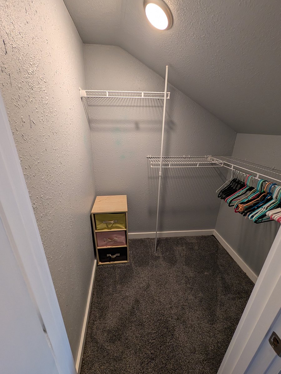 Walk in closet inside bedroom with private exterior lock if needed.