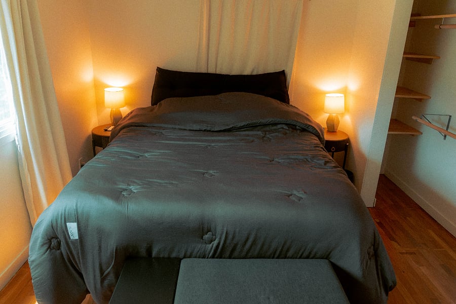 Master Bedroom: California King size bed w/ nightstands + closet