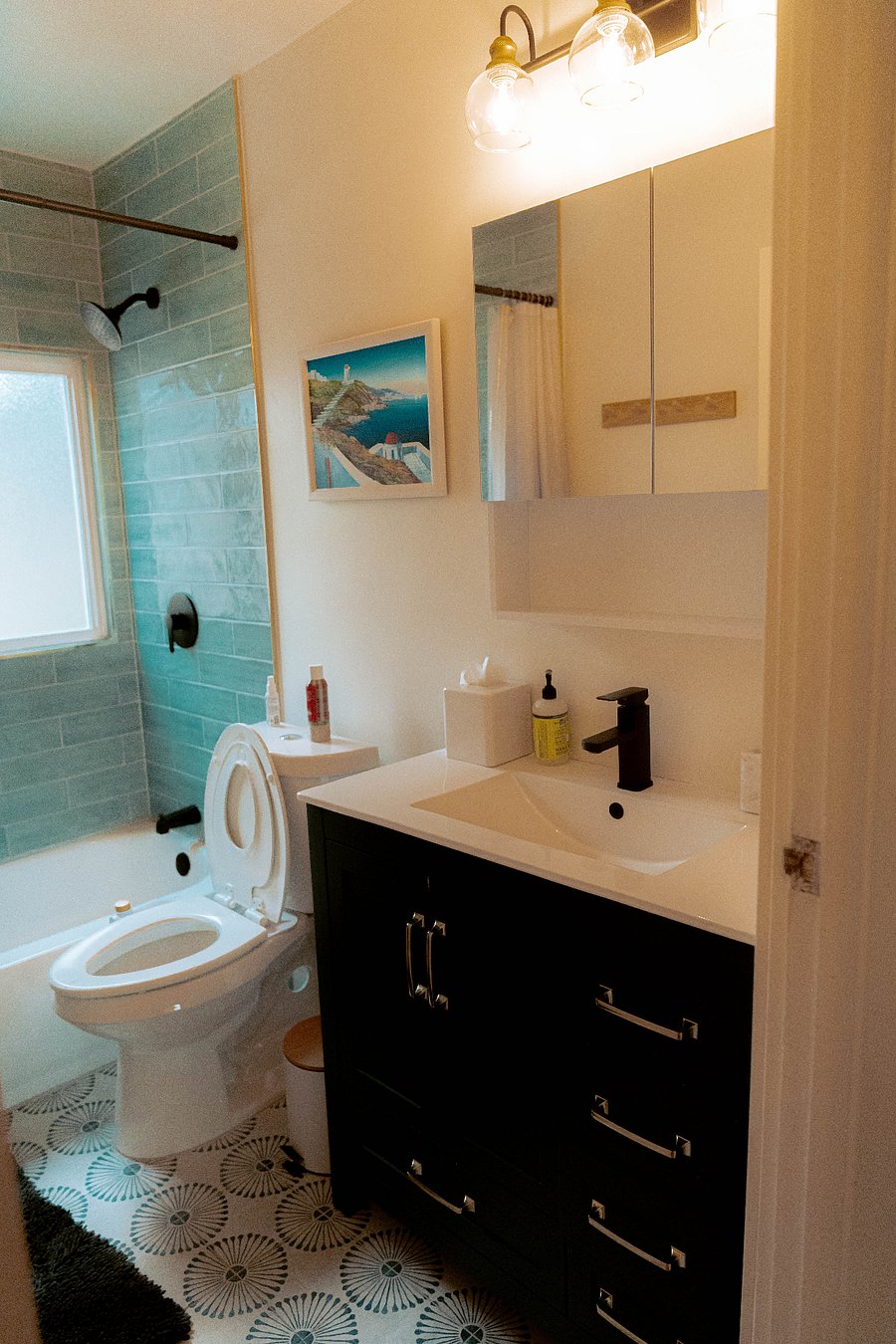 Full Bathroom: Toilet w/ Bidet + child's seat, medicine cabinet + plenty of drawers.