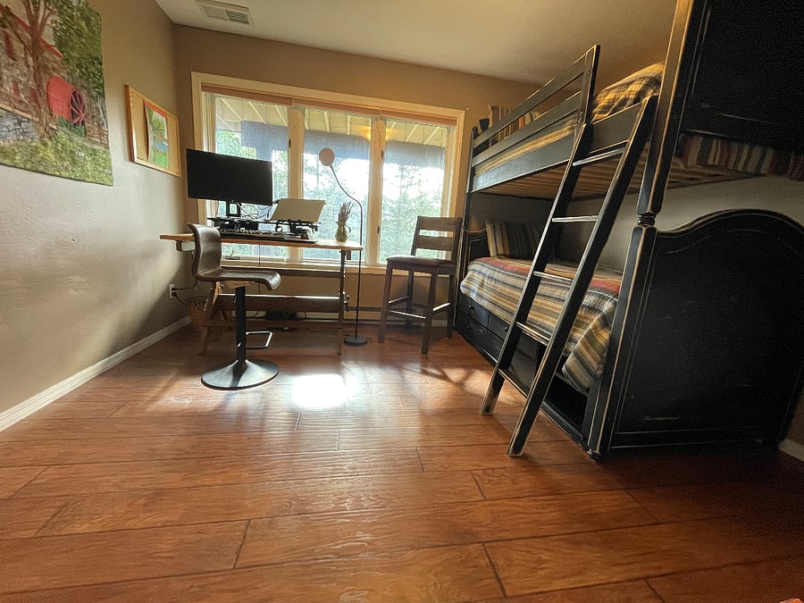 3rd bedroom with bunk beds and work station