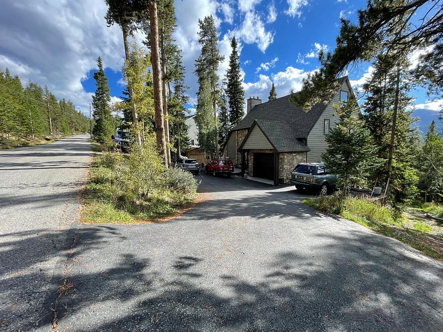 front of house, driveway and road