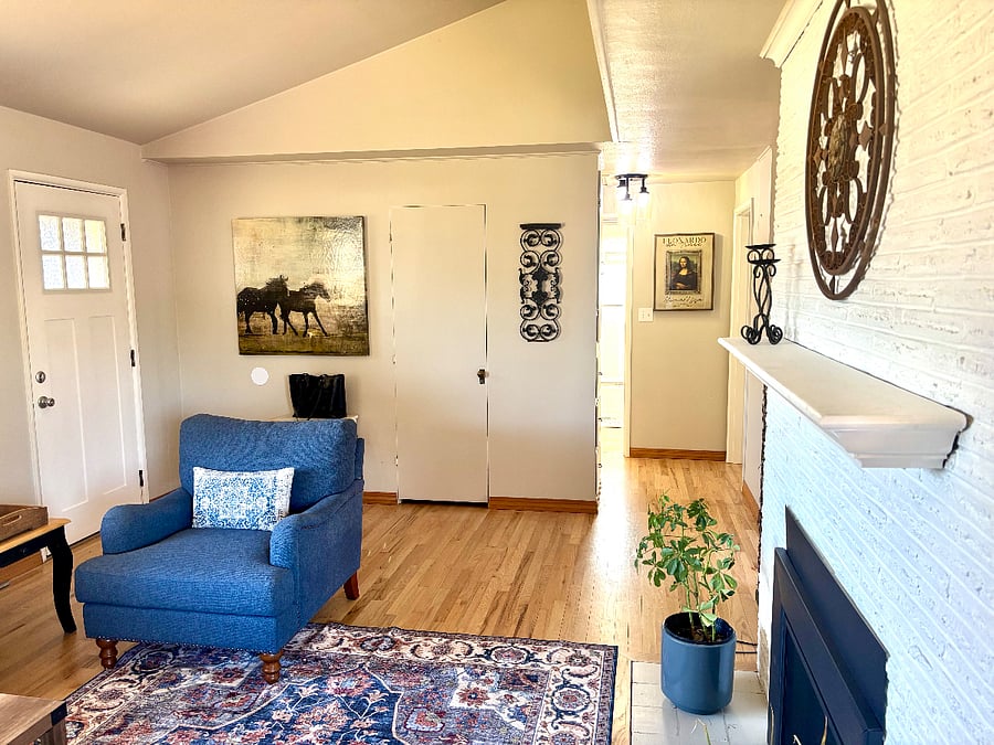 The hardwood floors have a beautiful finish and ceilings are vaulted in the living room