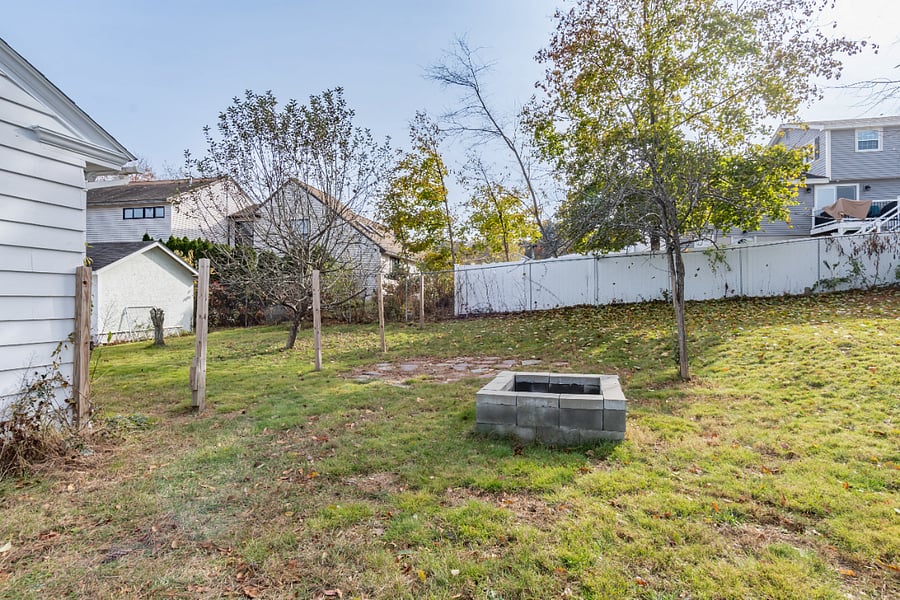 large yard with fire pit