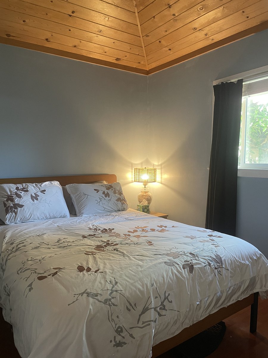 Cottage with queen-sized bed.