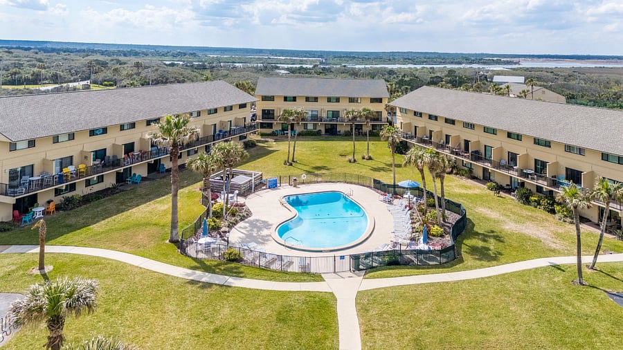 pool with unit building in the back.