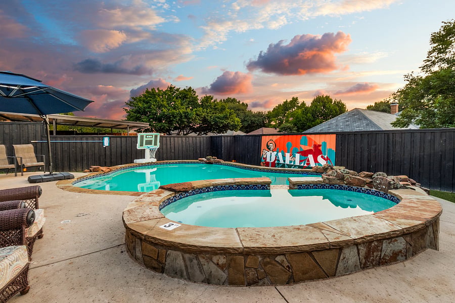Pool & Backyard: Private backyard oasis with an in-ground pool, spa, outdoor seating, and a fully fenced yard.