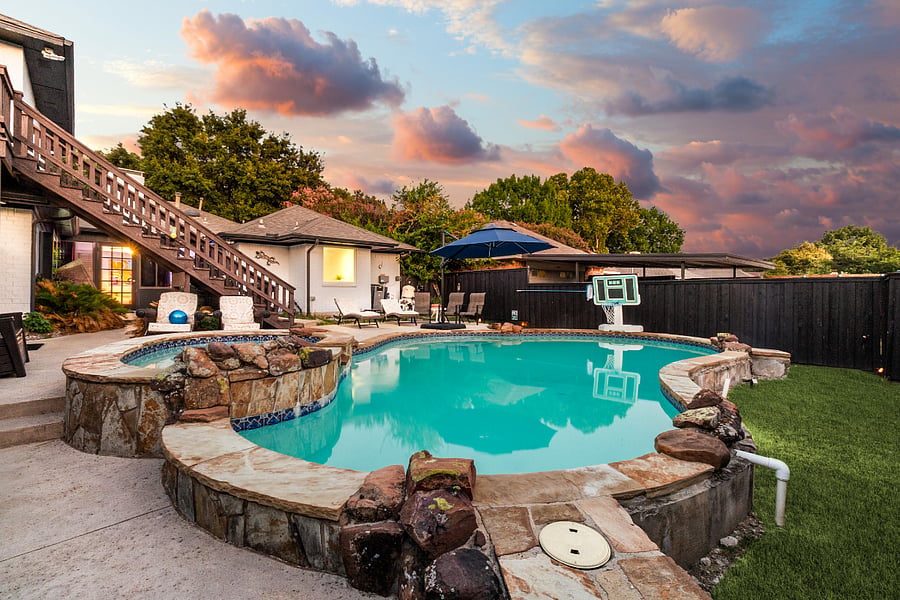 Pool & Backyard: Private backyard oasis with an in-ground pool, spa, outdoor seating, and a fully fenced yard.