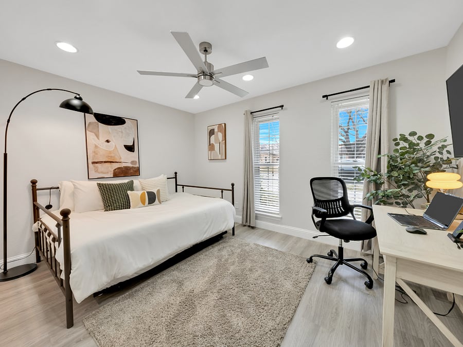 Queen Bedroom & Workspace: Comfortable queen bedroom with a dedicated desk and office chair, giving you a convenient space to rest, work remotely, or catch up on emails.