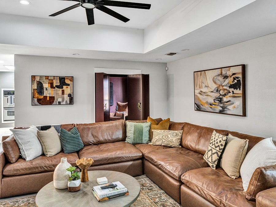 Living Room: Spacious living room with a large sectional and plenty of room to relax together.