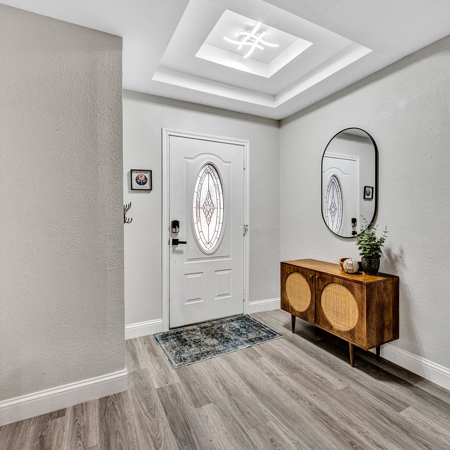 Front Entrance: A bright, welcoming entryway that offers a warm first impression as you step into the home.