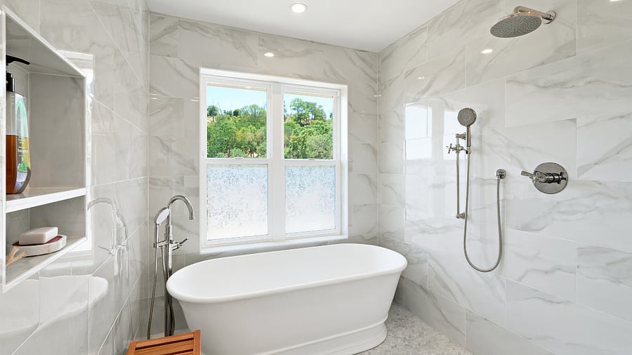 Bathroom with soaking tub and rain shower.