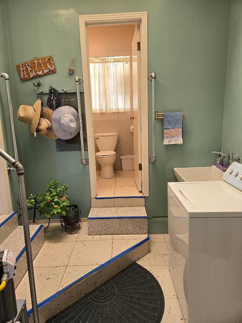 Upon entering semi-private entrance, the semi-private bathroom is directly ahead, up the steps. Kitchen is the door to the left of bathroom