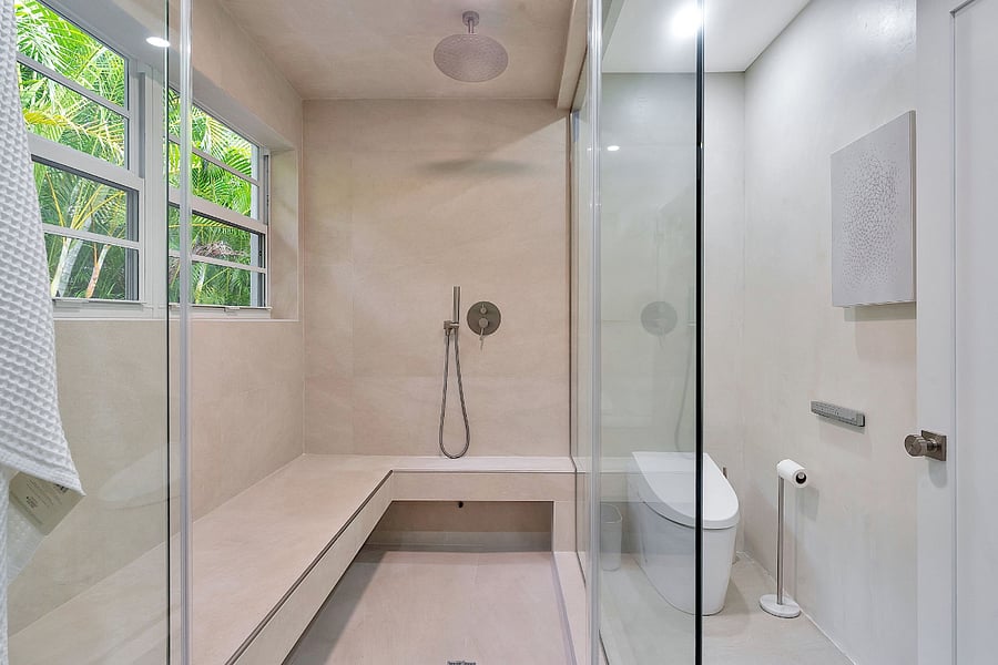 Master bathroom with large steam shower with seating for 2 powered by Mr Steam. Toto Neorest toilet with bidet, warmed seat, fan, automated lid.