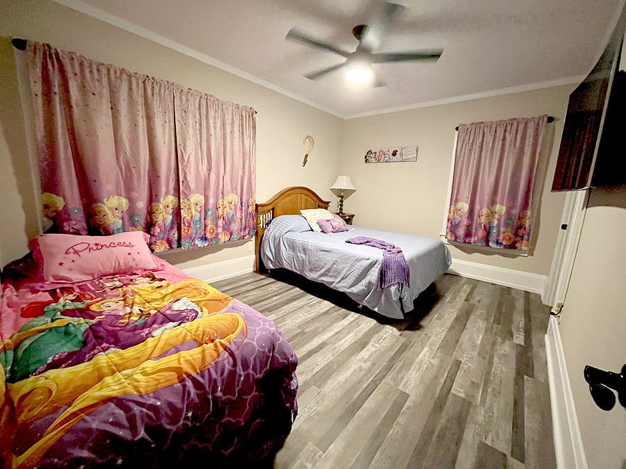 There is a fan in every room of the house, and each bedroom offers home-away-from-home comfort.