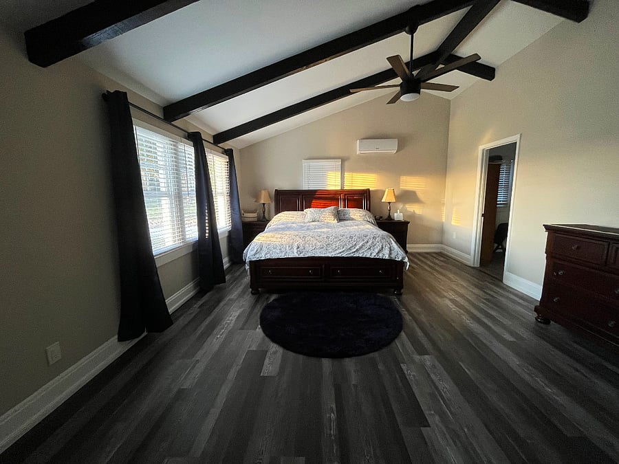 The first floor Master suite has beautiful sunset views, a spacious closet and large walk in shower. There is a mini split in this room so you can set the room to your desired temperature