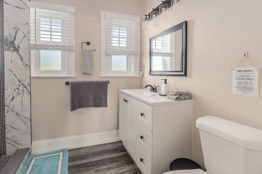 All three bathrooms in the house have been beautifully renovated with walk-in showers.