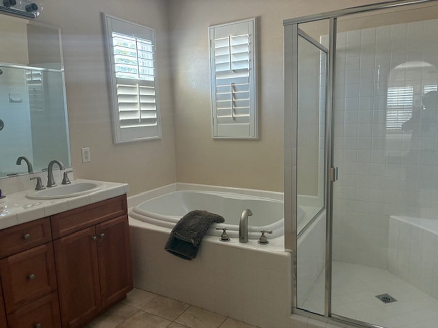 Full bathroom attached to primary bedroom