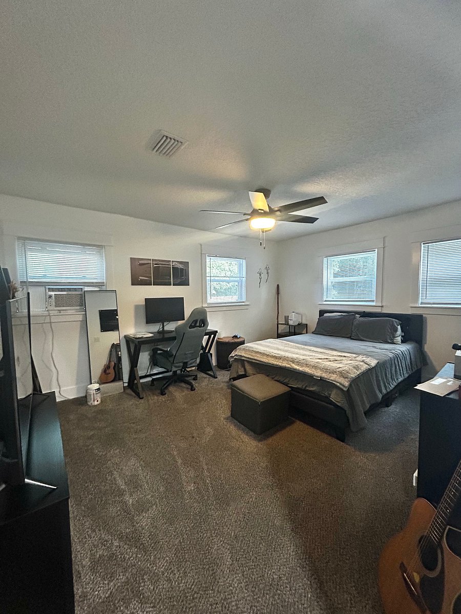 Guest bedroom - but previous tenant's furniture. I am able to supply a dresser, shelving unit and queen sized bed (with bedding) if needed. 