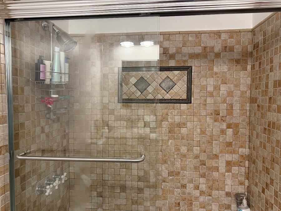 Downstairs bathroom shower/bath. (Water pressure is amazing!!!)