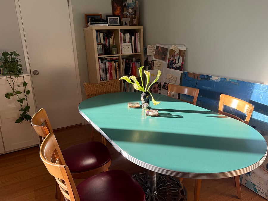 Dining table (but it's also very fun to sit at the bar stools)