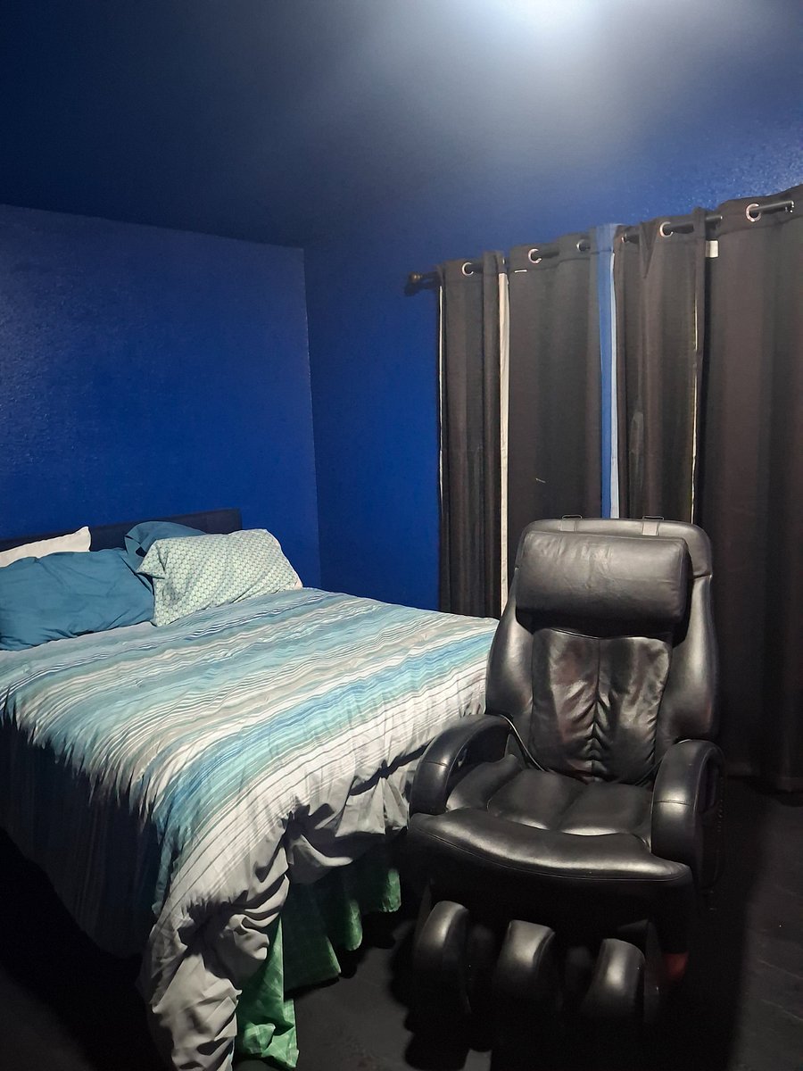 Queen size bed with 60 inch TV
