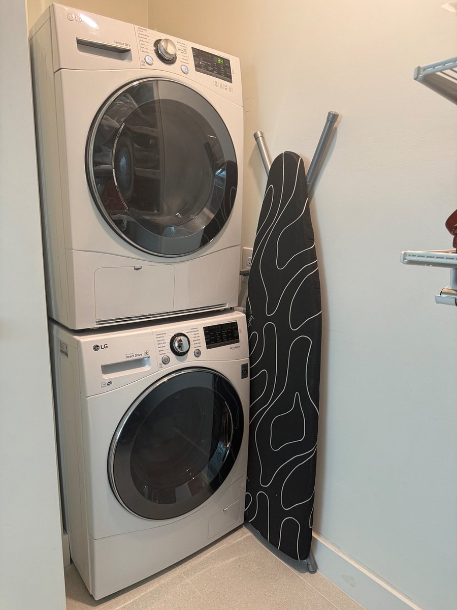 Washer and dryer located in secondary bedroom 