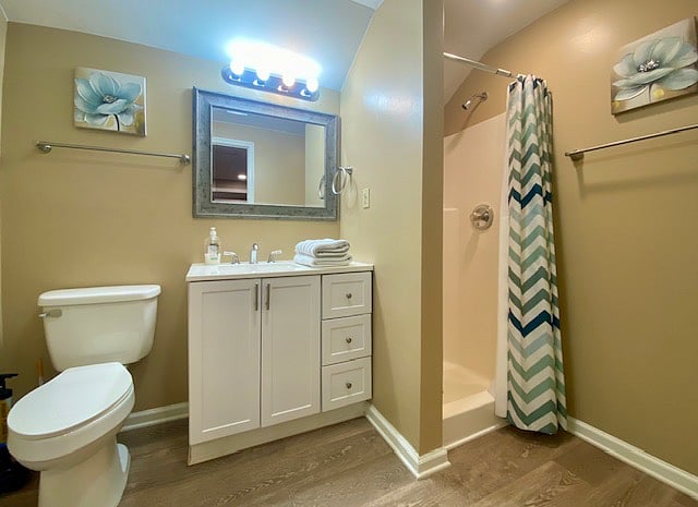Private bath with shower in King Bedroom lower level.