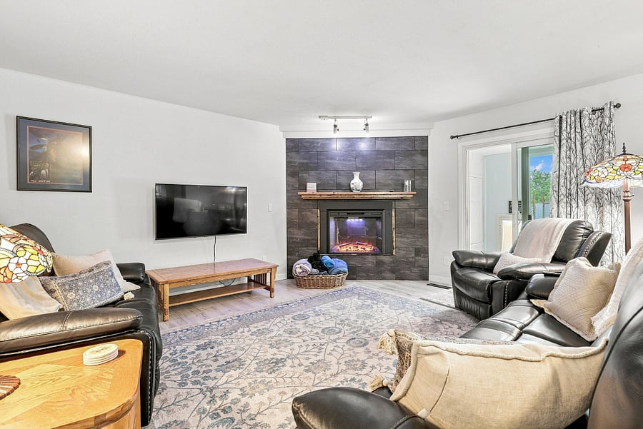 Main living room (living room floor): a recliner plus two couches, each with two reclining seats.