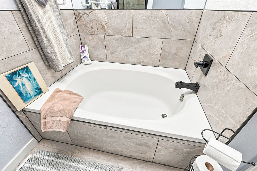 Master Bath (upstairs in master bedroom): Large tub, beautifully tiled, relax and get really comfortable.