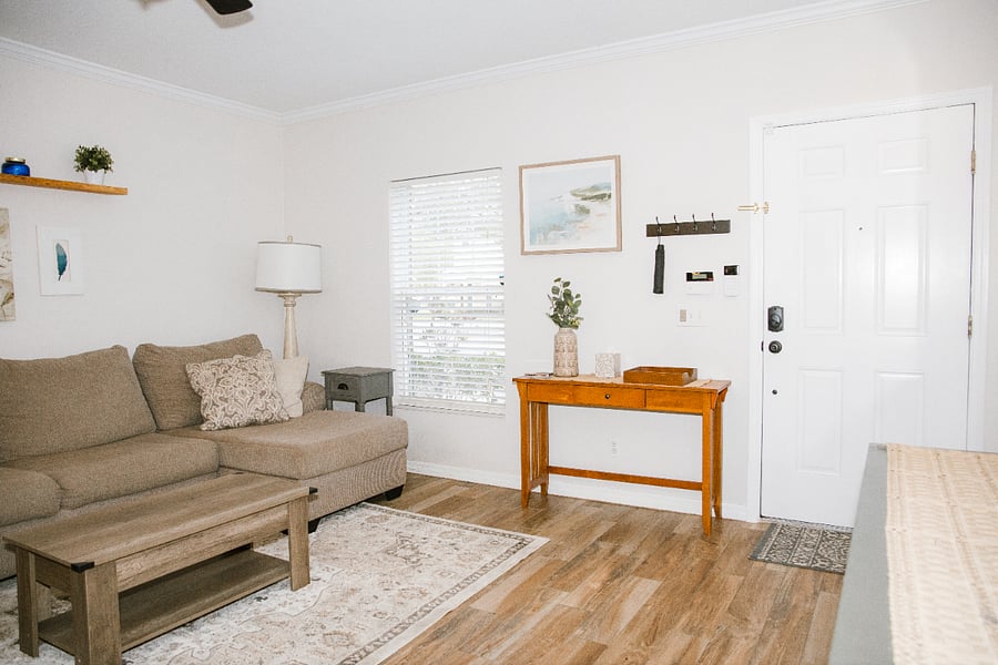 Entryway; An entryway table to drop your items when arriving home, and hooks to help your everyday items stay organized.