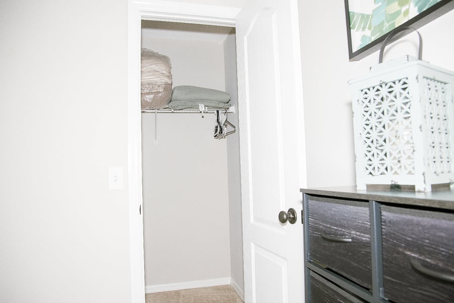 Secondary bedroom closet with extra linens