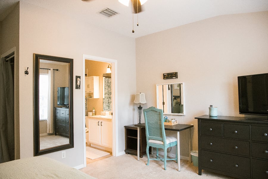 Primary Bedroom; Large dresser, TV with firestick, vanity space, full-length mounted mirror, and en-suite bathroom