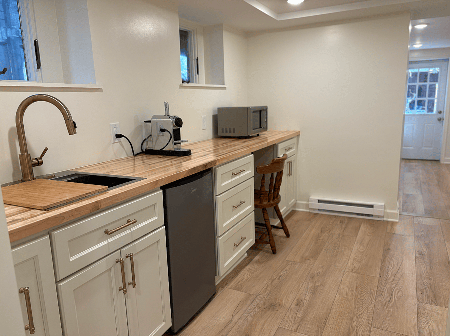 UNIT1: Kitchenette with a microwave, full size fridge, a drink fridge, hot plate and a espresso machine. 