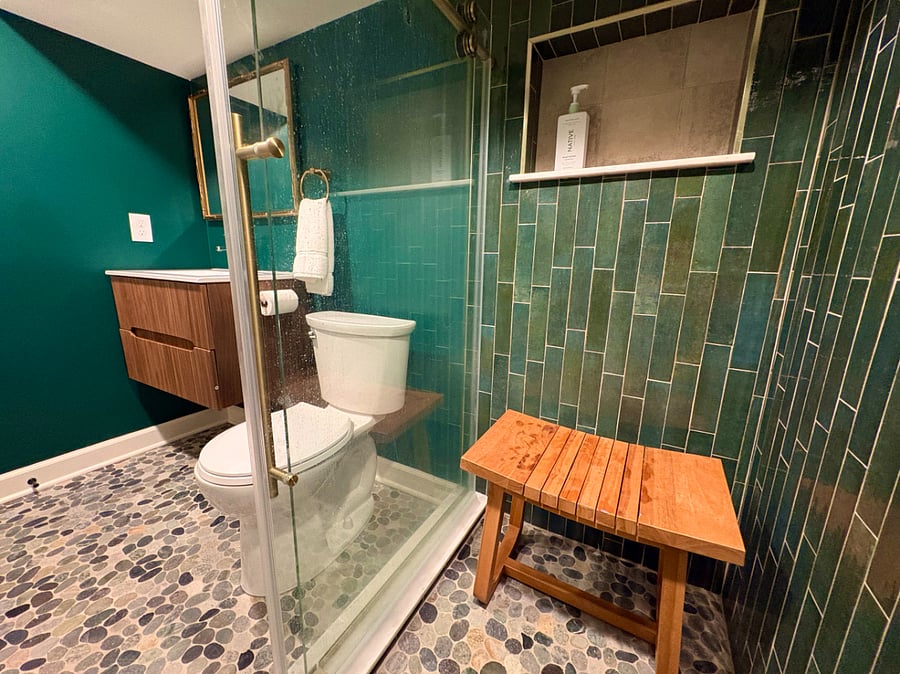 UNIT1: Emerald Full Bathroom with standing shower, toilet and vanity.