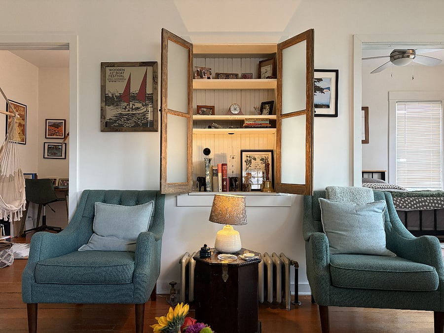 Other side of the living room - complete with vintage-looking built-in storage spaces