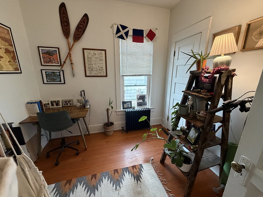 Other side of the office - with bike rack behind the door and more warm lighting