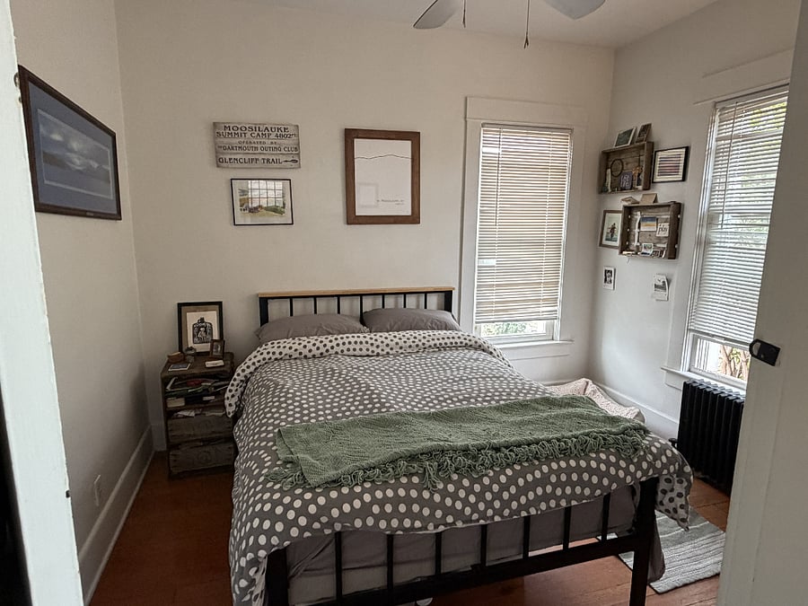 Bedroom - ample closet storage and a chest of drawers by the windows