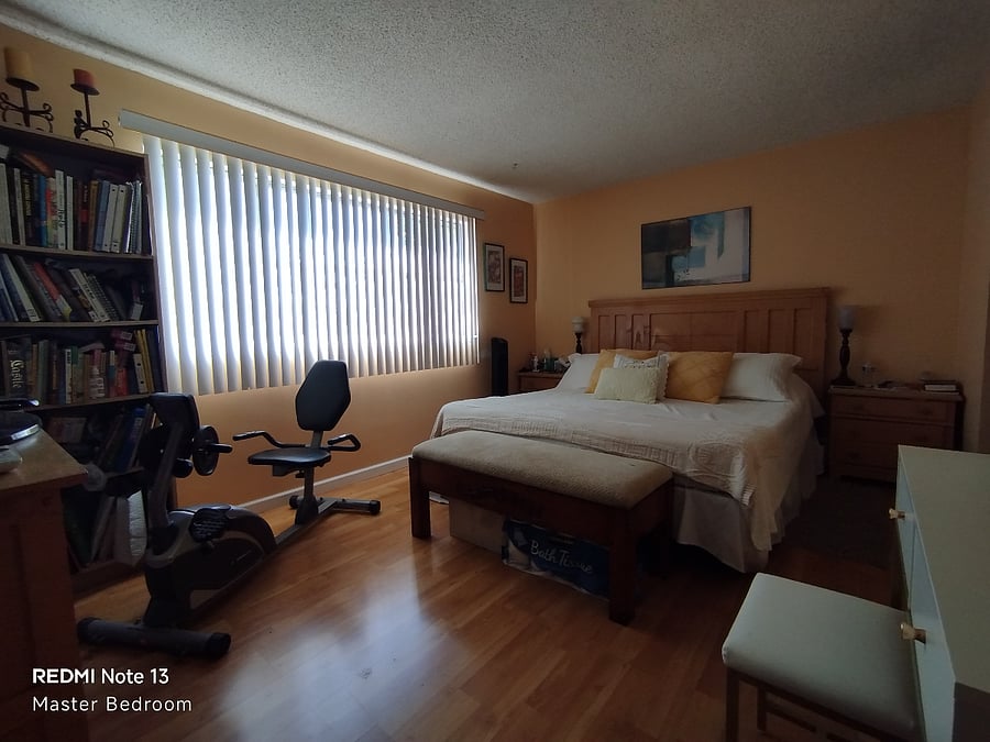Cal King Bed, Master bedroom with Smart TV and Recumbent Bike