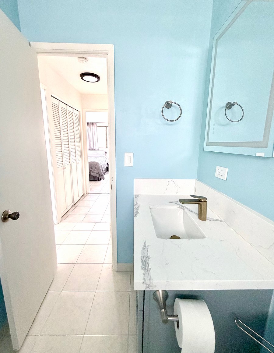 Shower bathroom facing hallway