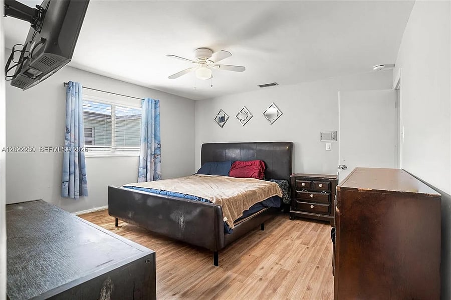master bedroom with walk in closet