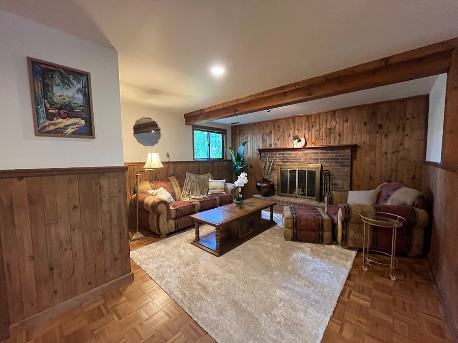 Living room with full sized pull out sofa and smart TV