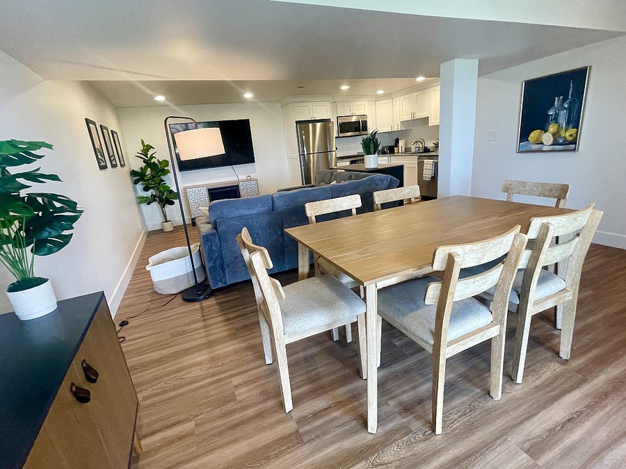 Open living space with kitchen, dining and living room.