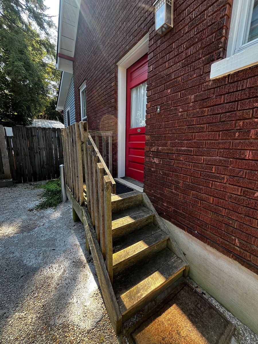 Entrance to the upstairs apartment is thru the side door- up to the second floor apartment. At the base of the stairs there is room for bike storage.