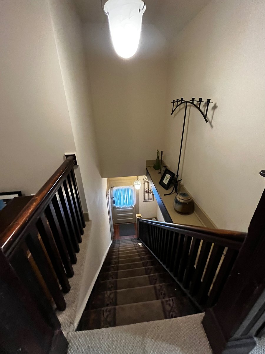 Stairs up from the front door- that has a keyless code entry.