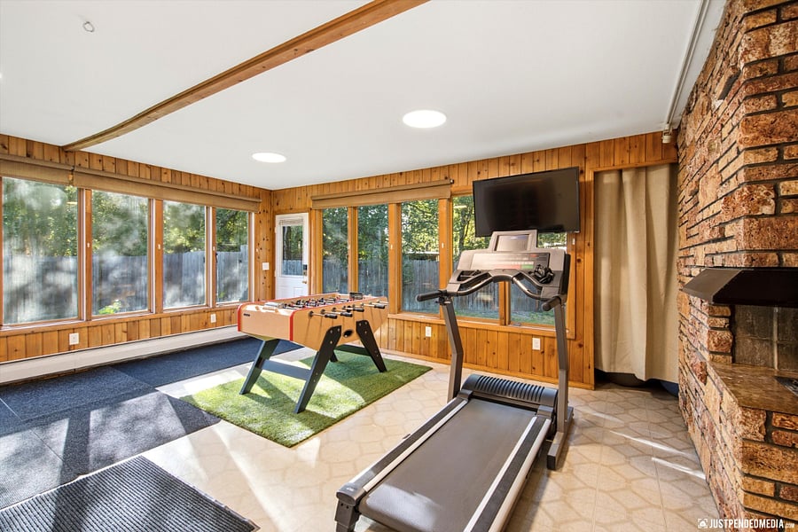 Sunroom/exercise/recreation room-foosball & treadmill